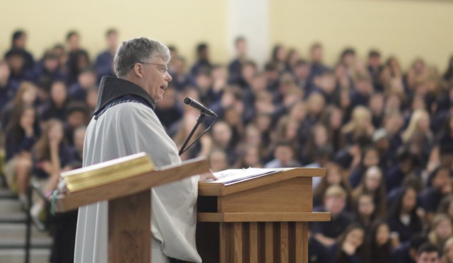Father Tom leads the school in the Ash Wednesday Prayer Service on February 14th. 