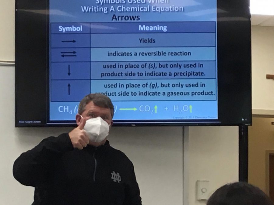 GC Chemistry teacher Mr. Haight photobombing class presentation.