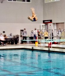 Good Counsel Diver Haley Marshall ‘22 achieves great height in her dive in a nearly perfect season. 
