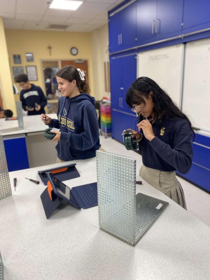 Good Counsel students work hard and enjoy an engineering class expanding their knowledge and learning new things that challenge them.