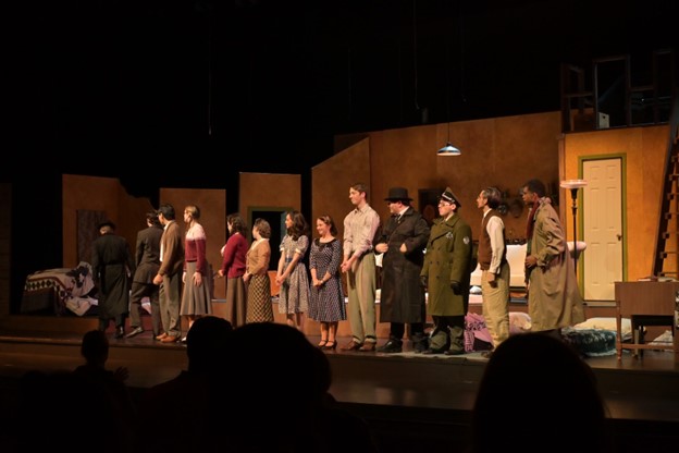 Performers taking a well-deserved curtain call after a performance of The Diary of Anne Frank.