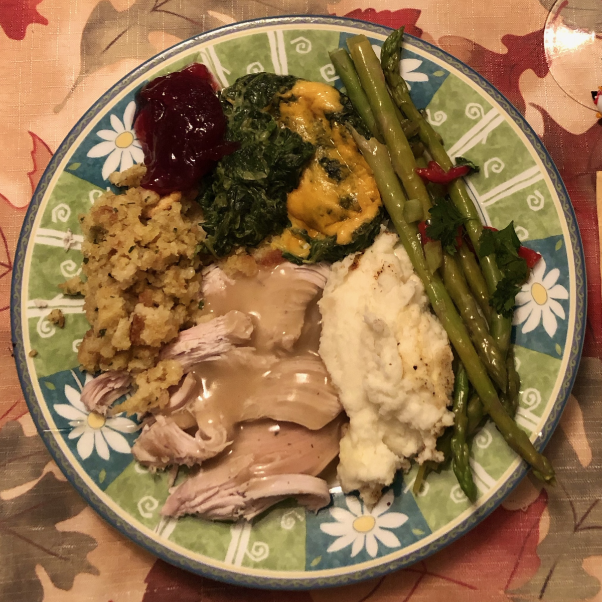 Grandpa’s spinach casserole and Holiday green beans are featured on this Thanksgiving plate!
