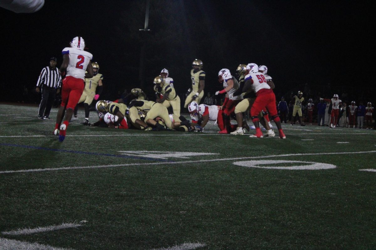 A Good Counsel defensive tackle holds the line in the second quarter to keep Dematha from scoring.