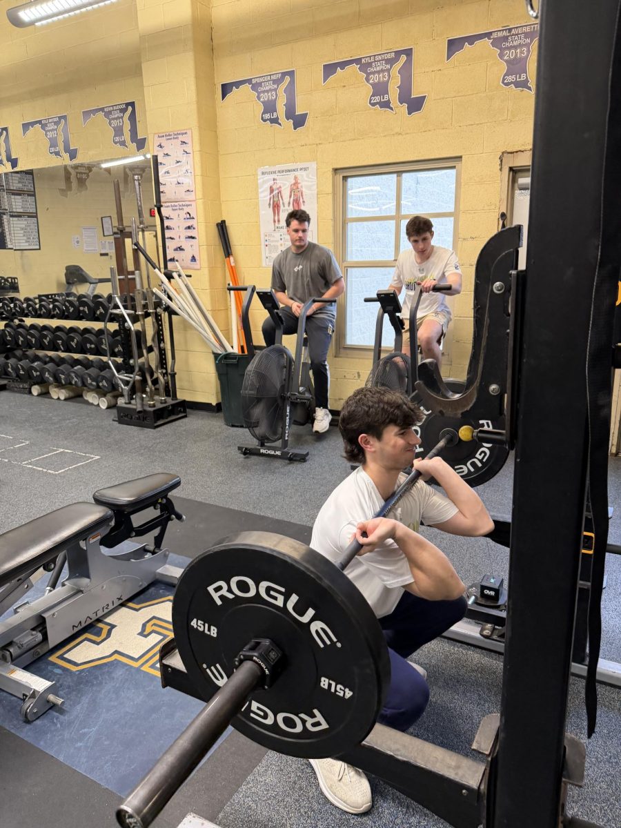 Good Counsel students work through Mr. Saar's strength-training class, building power and endurance.

S. Saar
