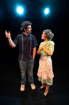 Usnavi (Georgio Sardelis ‘27) and Abuela Claudia (Grace Mueller ’27) sharing a moment