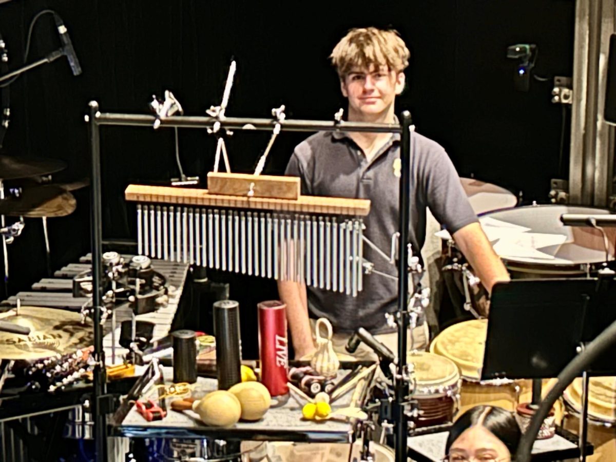 As part of a dynamic pit orchestra, George Hoag ’27 adds his percussion talents to the collective rhythm that powers the entire show.
