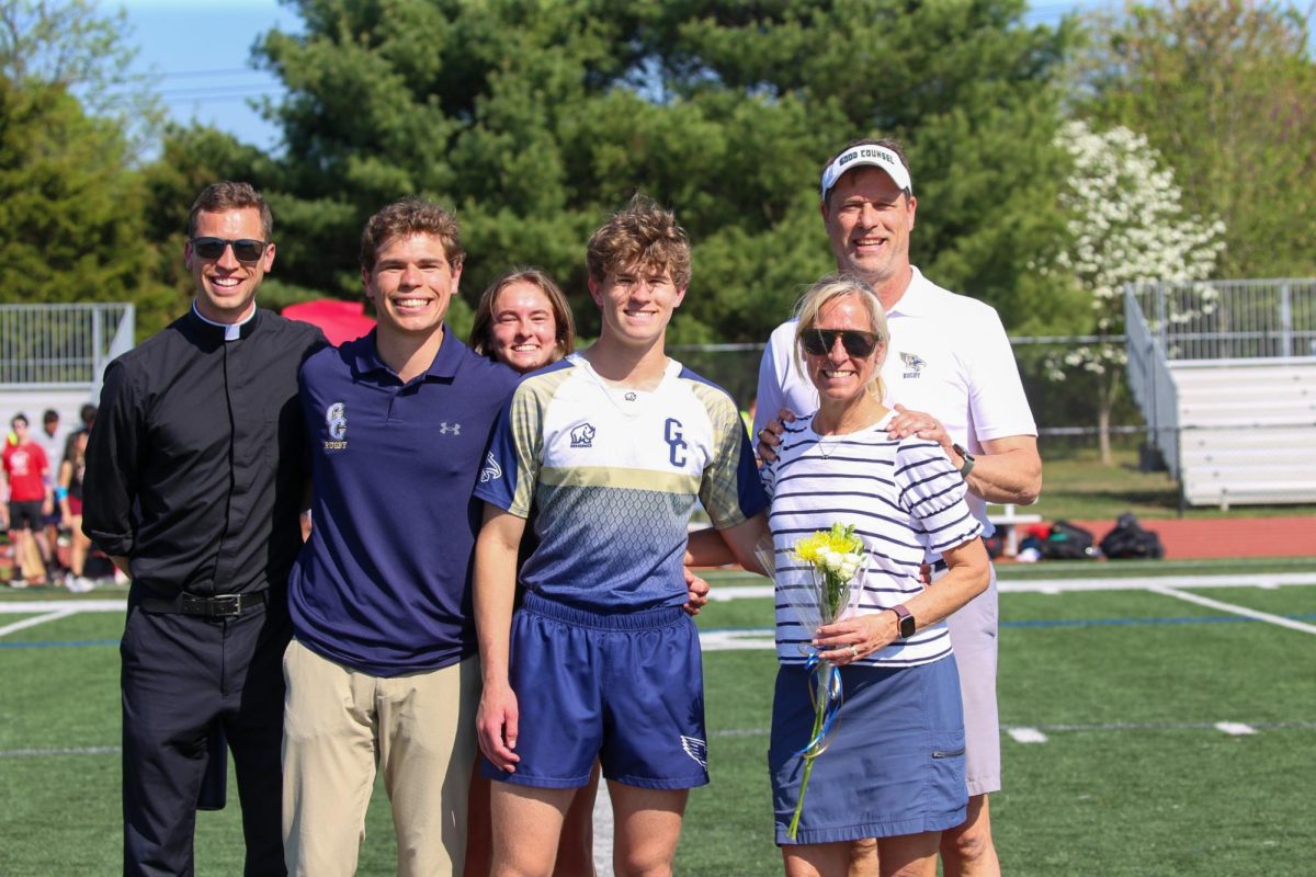 Rugby Captain Joseph Fangmeyer 27’ with his family on Senior Night.